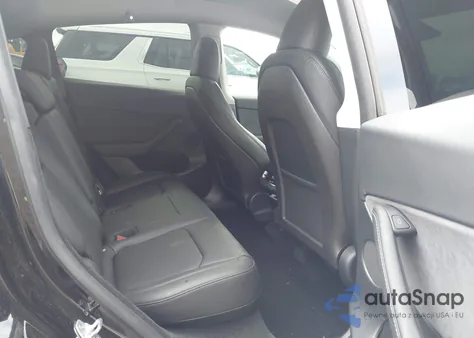 2024 Tesla Model Y Performance Dual Motor All-Wheel Drive z USA, uszkodzony, nr VIN 7SAYGDEF9RF046589